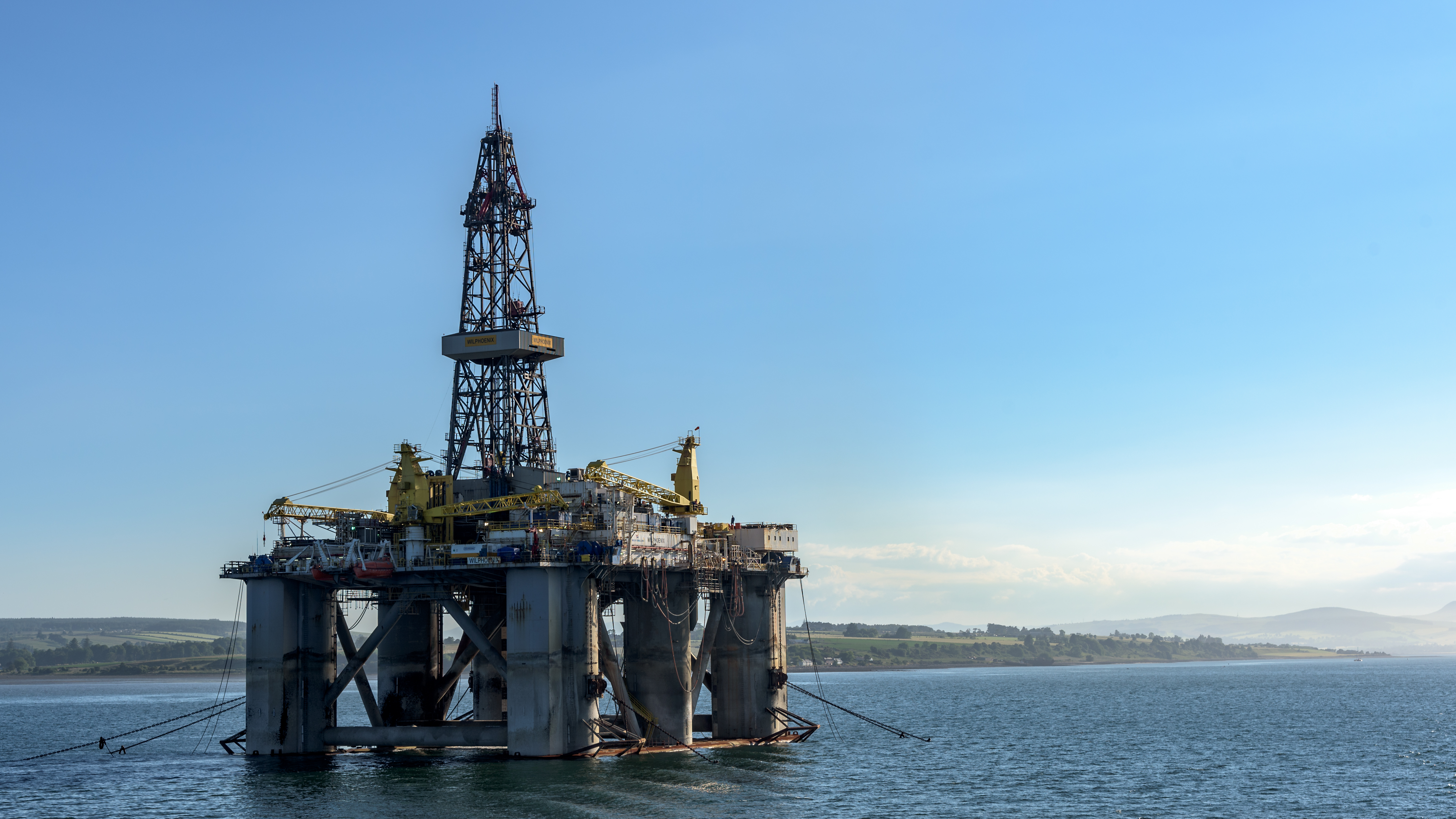 Offshore drilling rig positioned in coastal waters